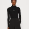 Calvin Klein Jeans Badge Roll Neck Sweater - Trui - Black