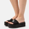 Calvin Klein Jeans Flatform Monogram - Muiltjes Met Hak - Black